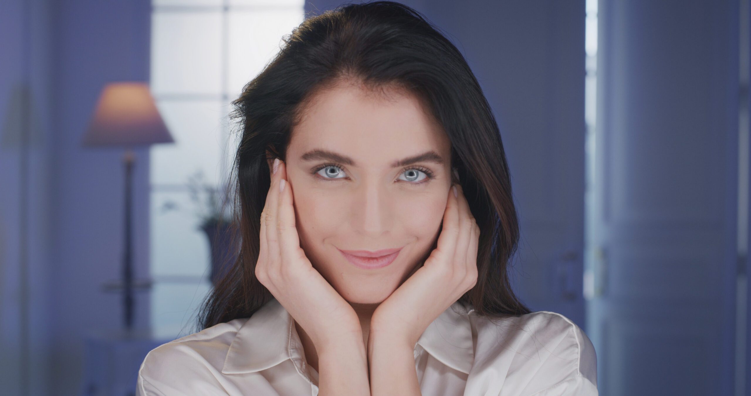 beauty shot of young woman with perfect face skin after applying moisturizing cream is SBI 350802031