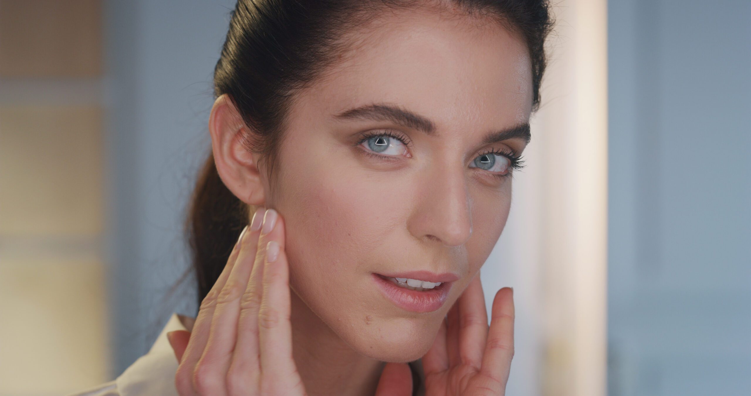 beauty shot of young woman with perfect face skin after applying moisturizing cream is SBI 351198684 beauty shot of young woman with perfect face skin after applying moisturizing cream is SBI 351198684