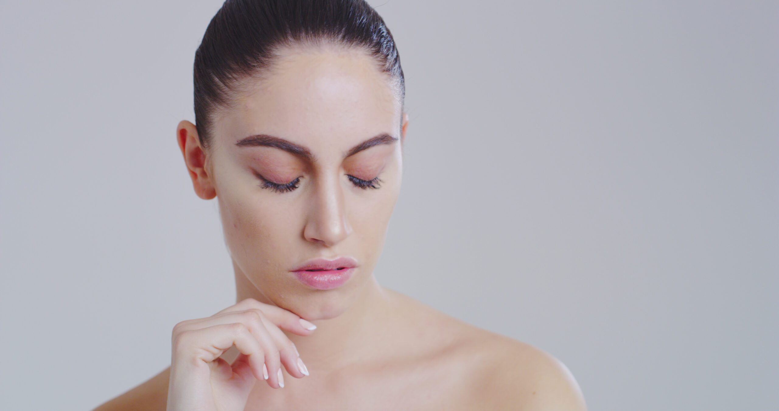 slow motion of woman with beautiful face and perfect skin just cleaned from impurities SBI 350615706